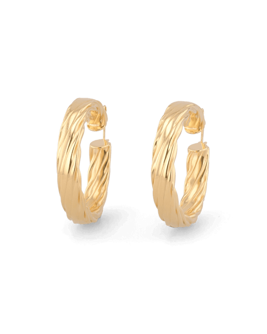 Image of Earrings. Product name - Drift Gold Hoop Earrings in colour by brand - LAVANA