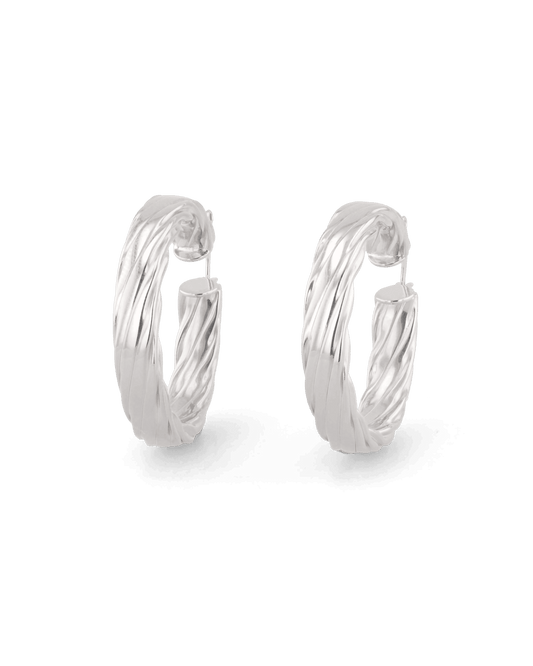 Image of Earrings. Product name - Drift Silver Hoop Earrings in colour by brand - LAVANA