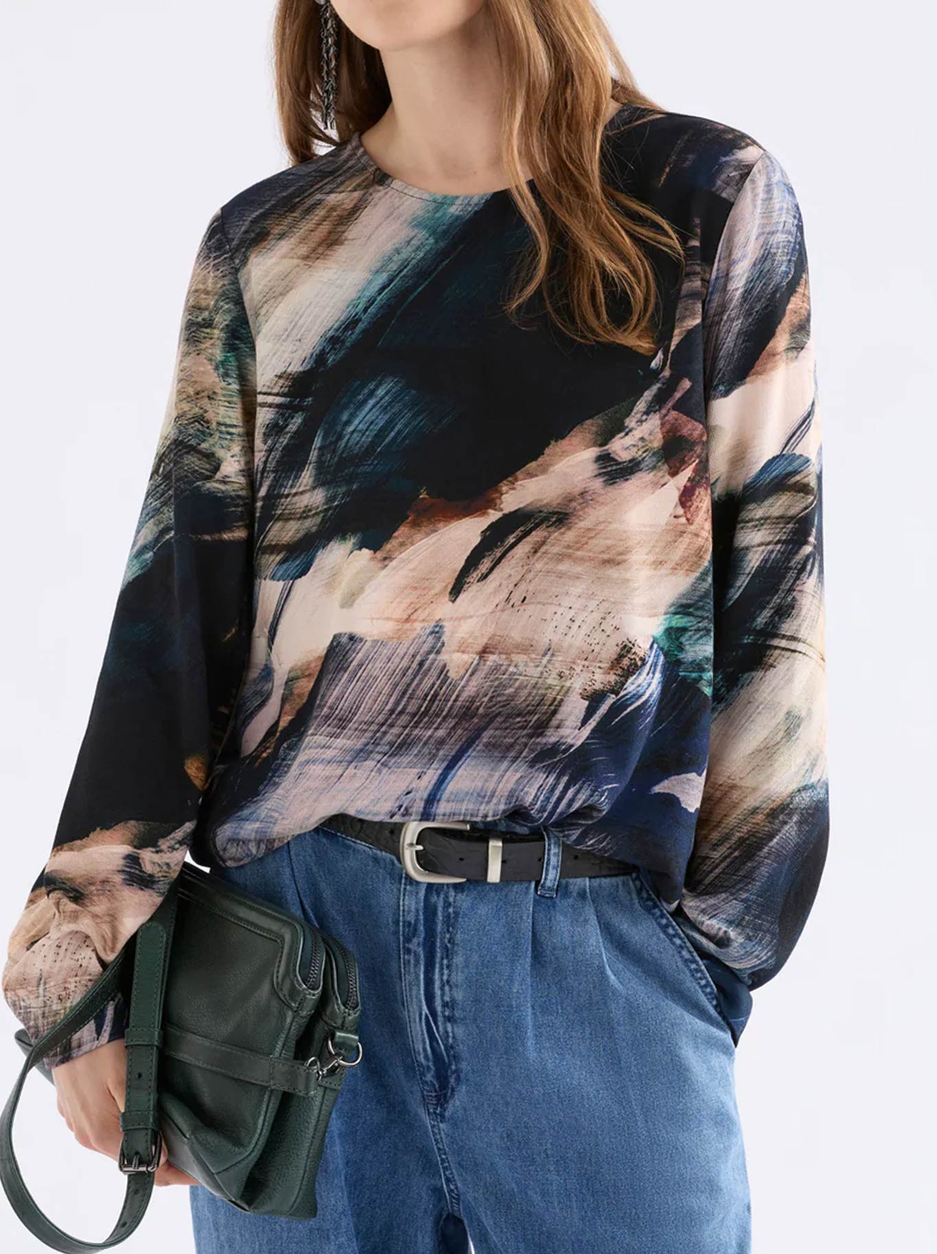 Image of a model wearing Tops. Product name - Elk Sofi Top in Holte Print colour by brand - Elk