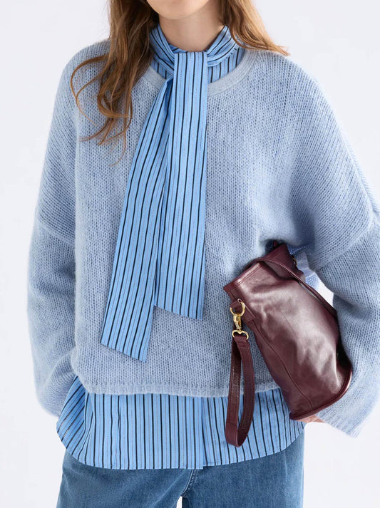 Image of a model wearing Outerwear. Product name - ELK AGNA SWEATER in Chestnut colour by brand - Elk