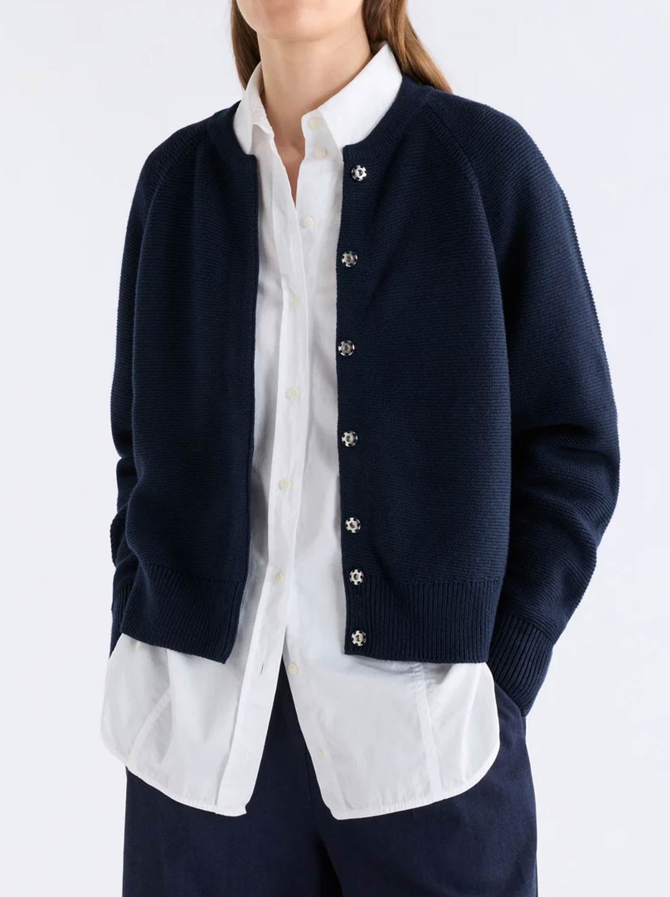 Image of a model wearing Outerwear. Product name - Elk Bolsa Cardigan in Twilight colour by brand - Elk