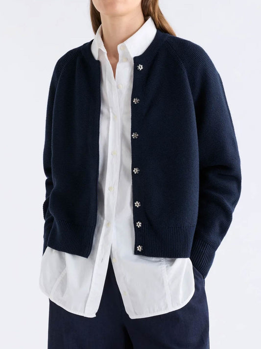 Image of a model wearing Outerwear. Product name - Elk Bolsa Cardigan in Twilight colour by brand - Elk