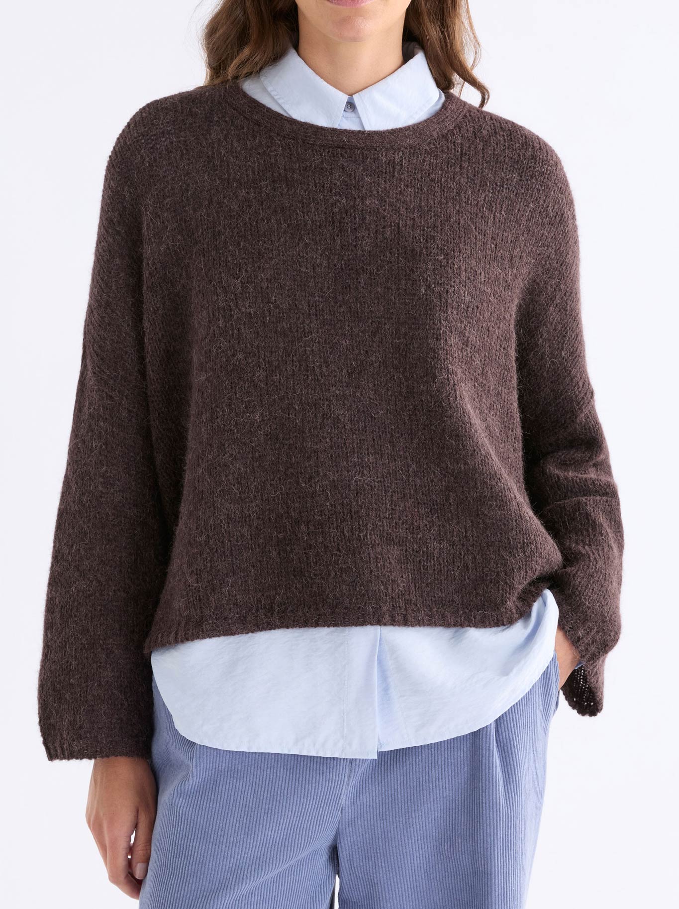 Image of a model wearing Outerwear. Product name - ELK AGNA SWEATER in Chestnut colour by brand - Elk