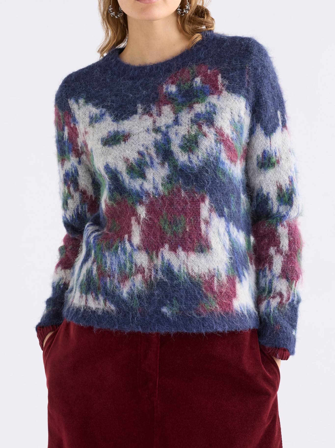 Image of a model wearing Tops. Product name - Elk Rhoda Sweater in Black/Cream colour by brand - Elk