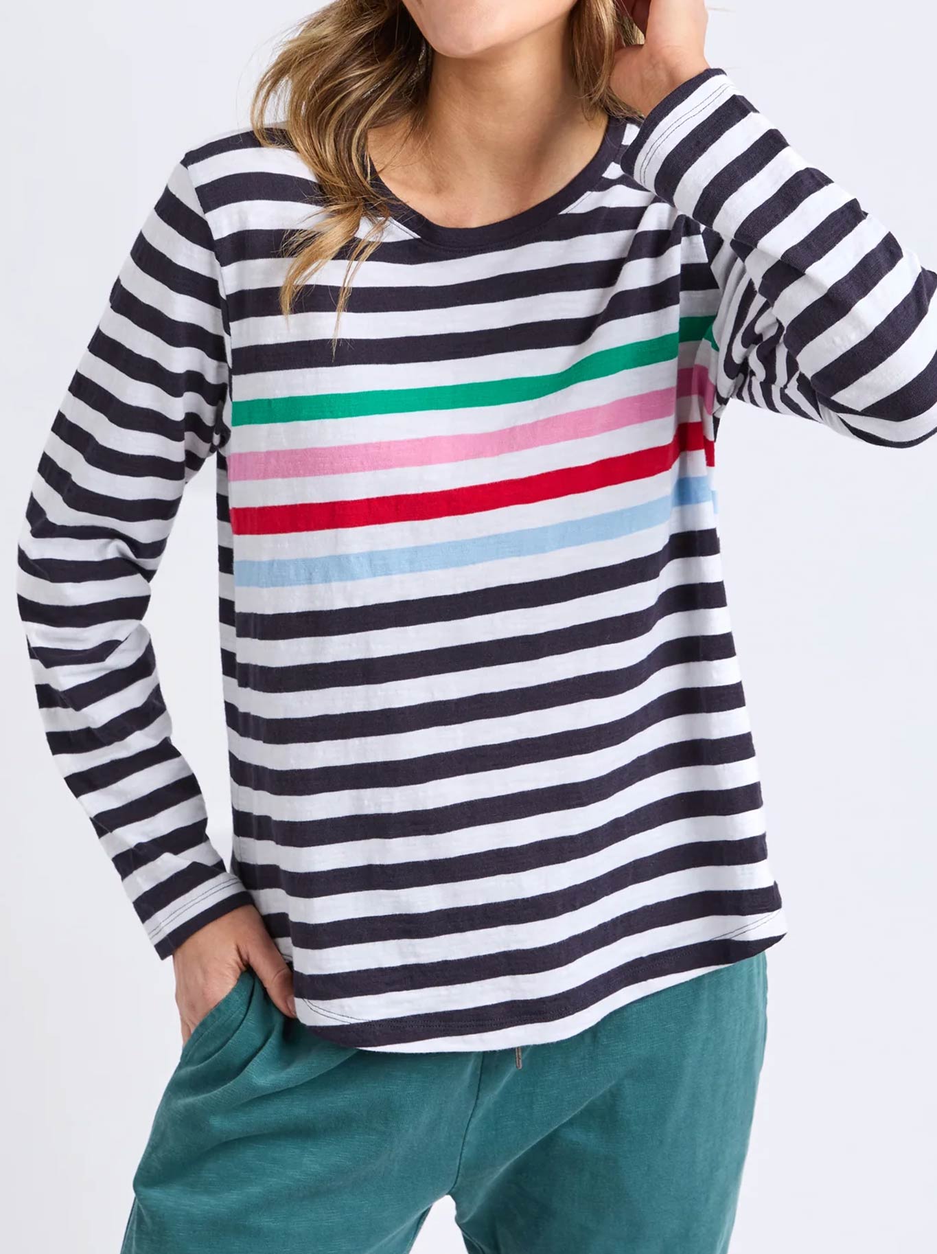 Image of a model wearing Tops. Productname: Elm Harmony Long Sleeve Tee in Rainbow colour by brand - Elm
