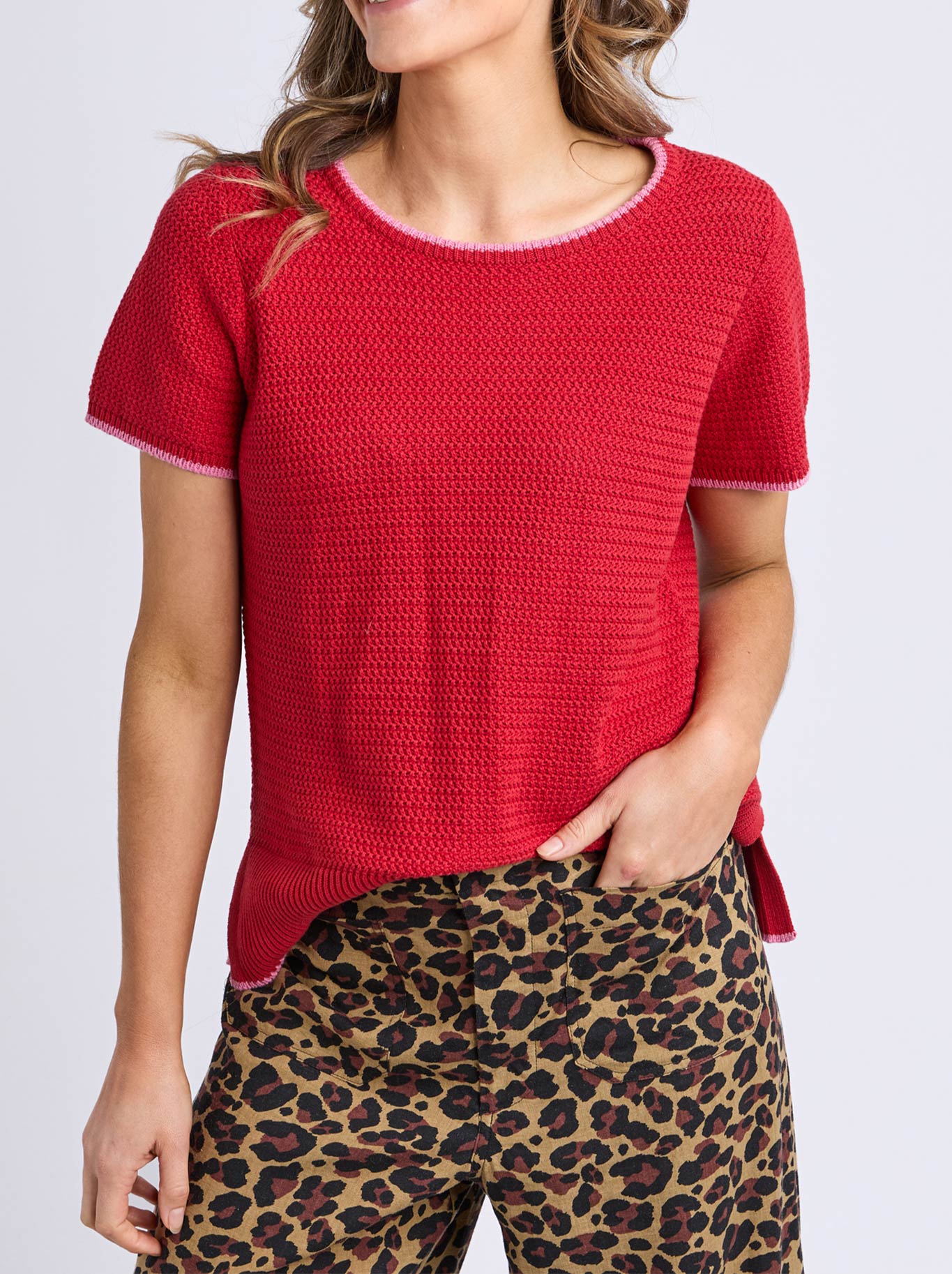 Image of a model wearing Tops. Productname: ELM CAMELLIA KNIT in Cranberry colour by brand - Elm