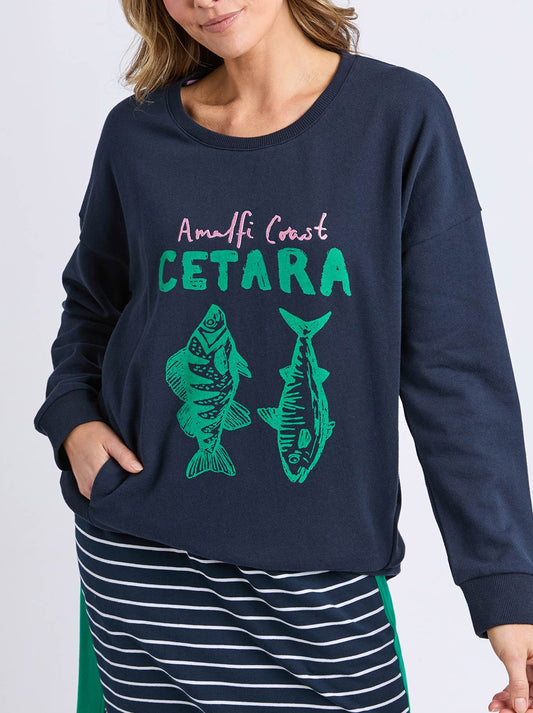 Image of a model wearing Tops. Productname: Elm Cetara Crew in Navy colour by brand - Elm