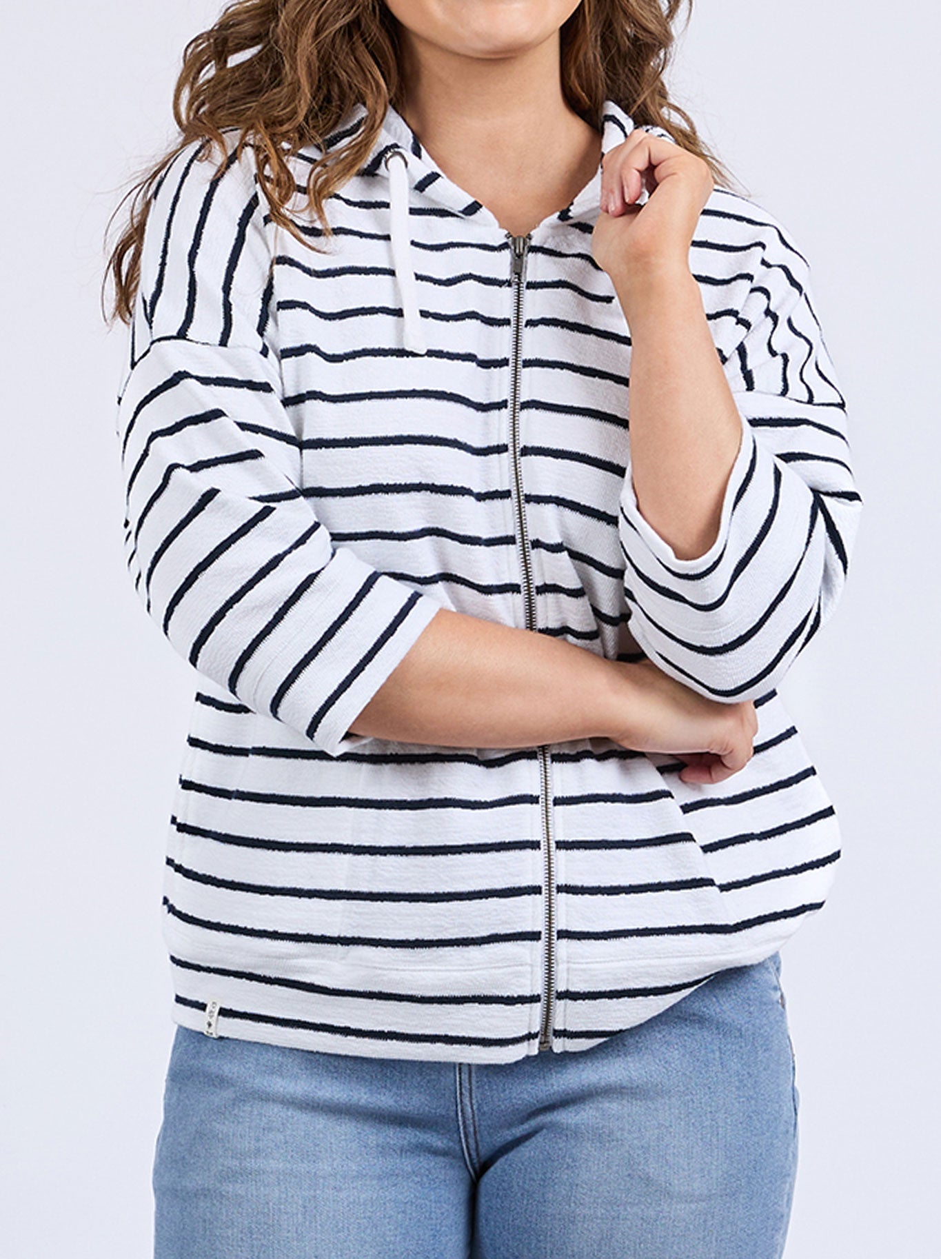 Image of a model wearing Outerwear. Productname: ELM BEACHY HOODIE in White Navy colour by brand - Elm