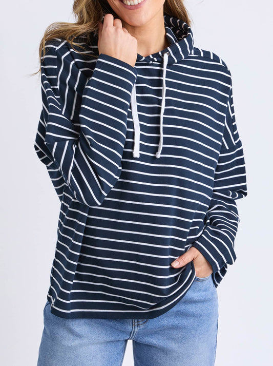 Image of a model wearing Outerwear. Productname: ELM RHEA HOODIE in Navy White Stripe colour by brand - Elm