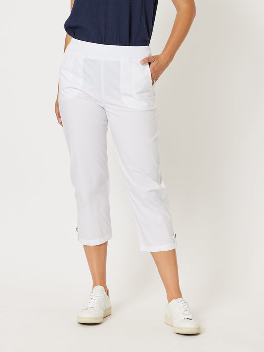 Image of a model wearing Pants. Product name - Santorini Cropped Cotton Pant White in White colour by brand - Threadz