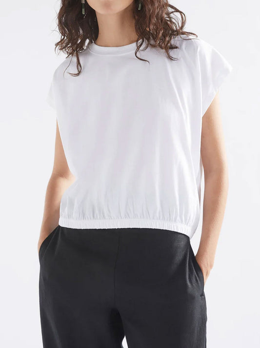 Image of a model wearing Tops. Productname: ELK KRUIS TEE in Black colour by brand - Elk