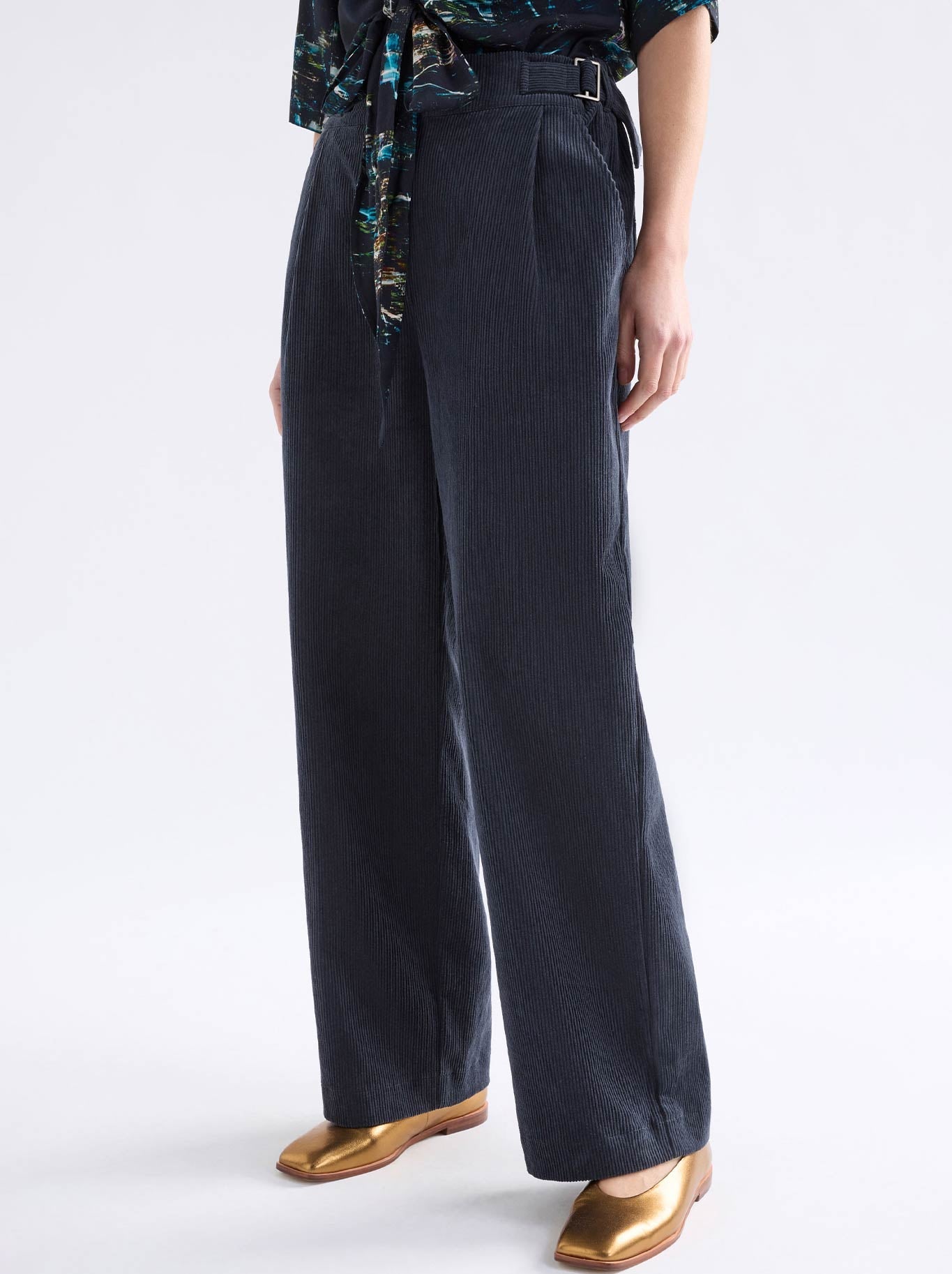 Image of a model wearing Pants. Productname: Elk Noemi Cord Pant in Carbon colour by brand - Elk