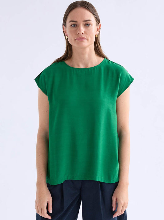 Image of a model wearing Tops. Product name - Elk Neues Top in Leaf Green colour by brand - Elk