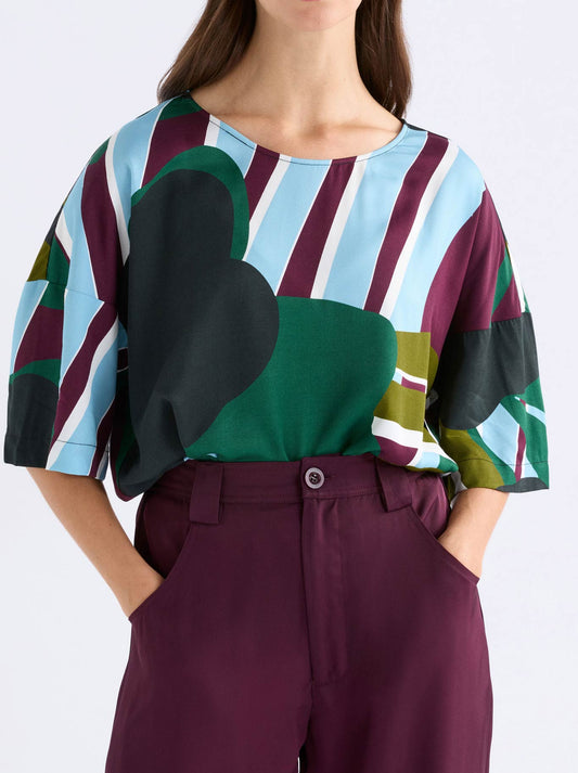 Image of a model wearing Tops. Product name - Elk Kobaii Top in Stribe Print colour by brand - Elk