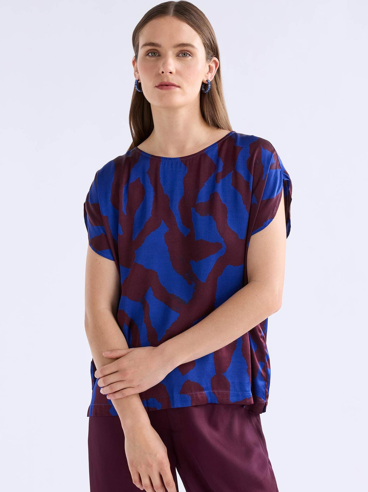 Image of a model wearing Tops. Product name - Elk Besa Top in Varr Print colour by brand - Elk