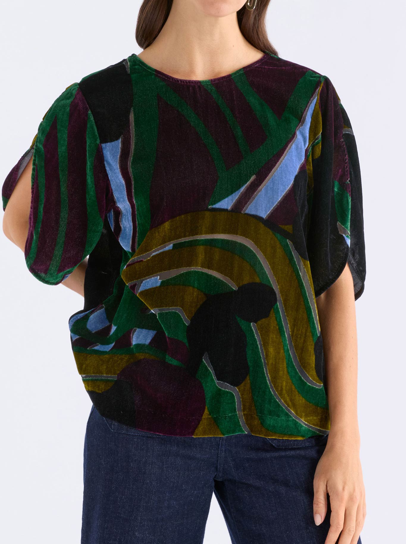 Image of a model wearing Tops. Product name - Elk Reihen Top in Stribe Burnout colour by brand - Elk