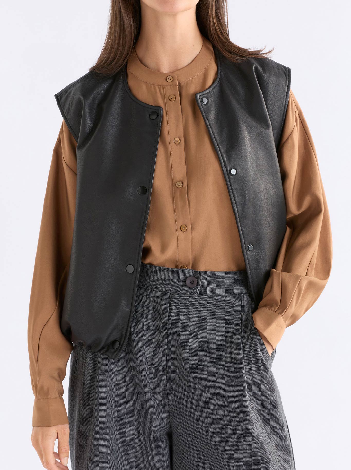 Image of Coats & Jackets. Product name - Elk Striind Leather Vest in Black colour by brand - Elk