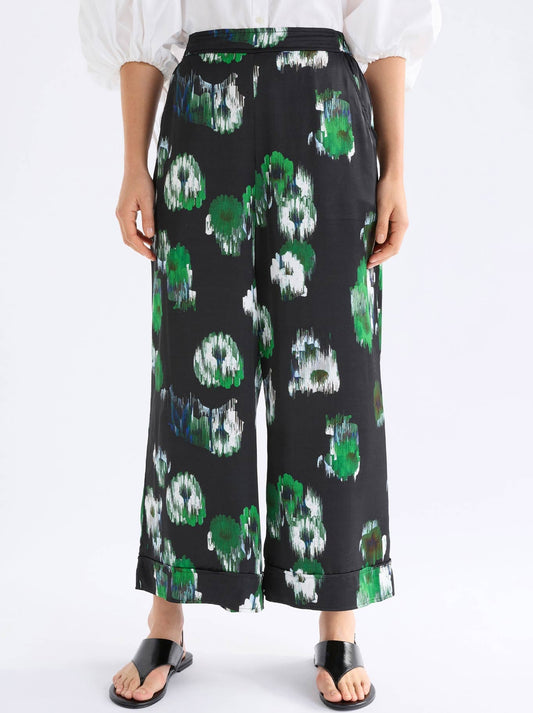Image of a model wearing Pants. Product name - Elk Foret Pant in Arkite Print colour by brand - Elk
