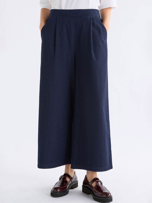 Image of a model wearing Pants. Product name - Elk Albez Pant in Dark Blue Denim colour by brand - Elk