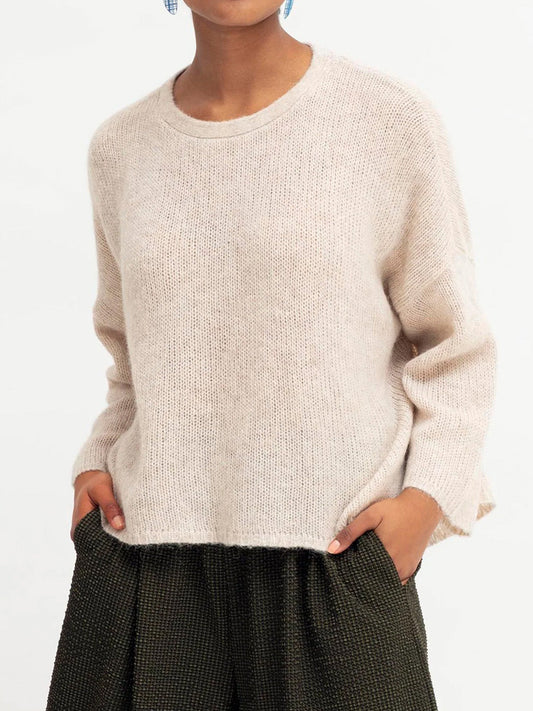 Image of a model wearing Outerwear. Product name - ELK AGNA SWEATER in Ecru colour by brand - Elk