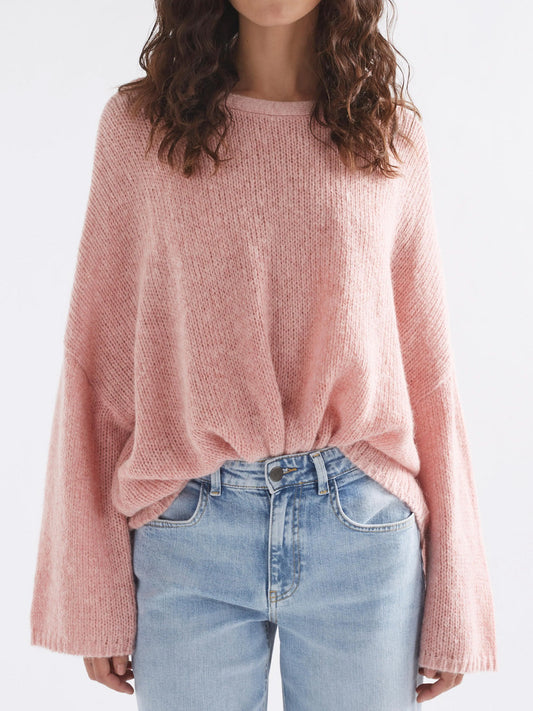Image of a model wearing Outerwear. Productname: Elk Agna Luna Sweater in Pink Salt colour by brand - Elk
