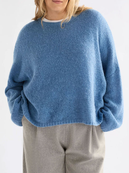 Image of a model wearing Outerwear. Productname: Elk Agna Luna Sweater in Chambray colour by brand - Elk
