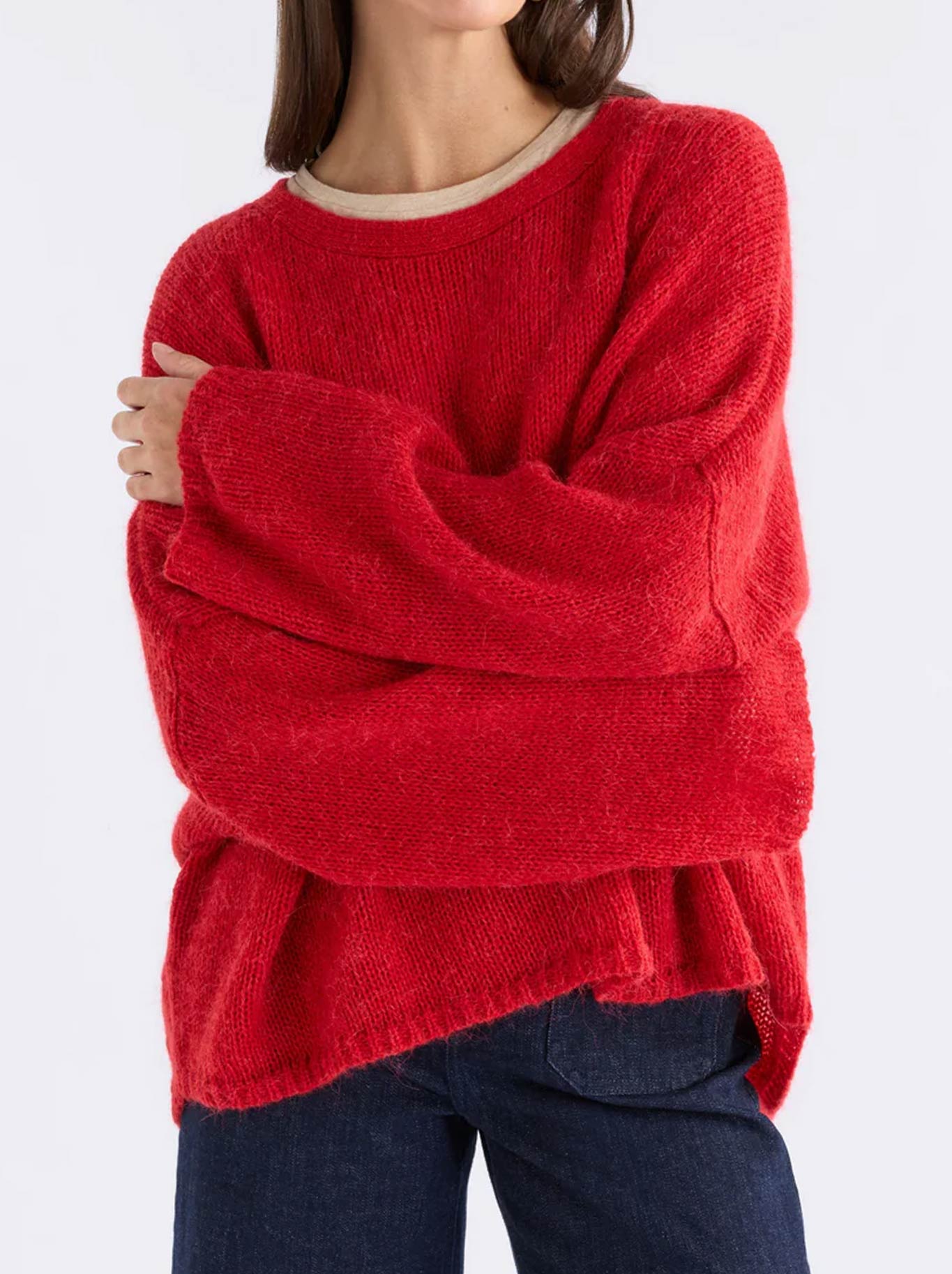 Image of a model wearing Outerwear. Product name - Elk Agna Sweater in Flame Red colour by brand - Elk