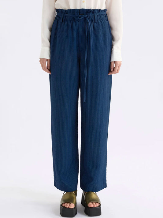 Image of a model wearing Pants. Productname: ELK STOLT PANT in Mid Wash colour by brand - Elk