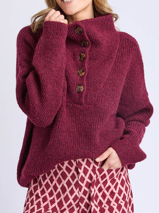 Image of a model wearing Outerwear. Product name - Elm Bron Button Knit in Maroon colour by brand - Elm