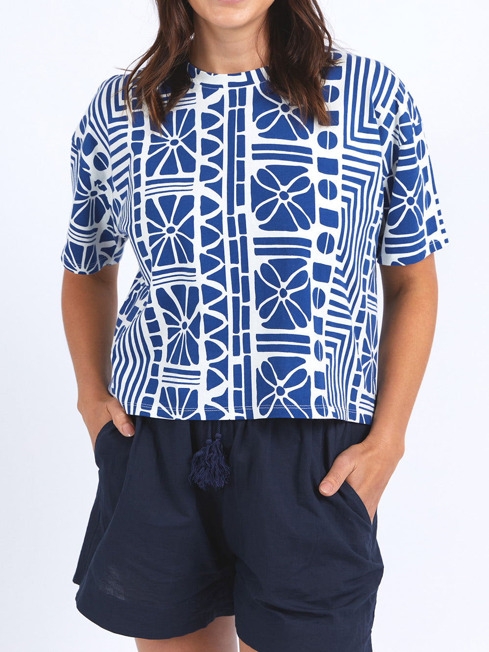 Image of a model wearing Tops. Productname: ELM CASABLANCA TEE in China Blue colour by brand - Elm