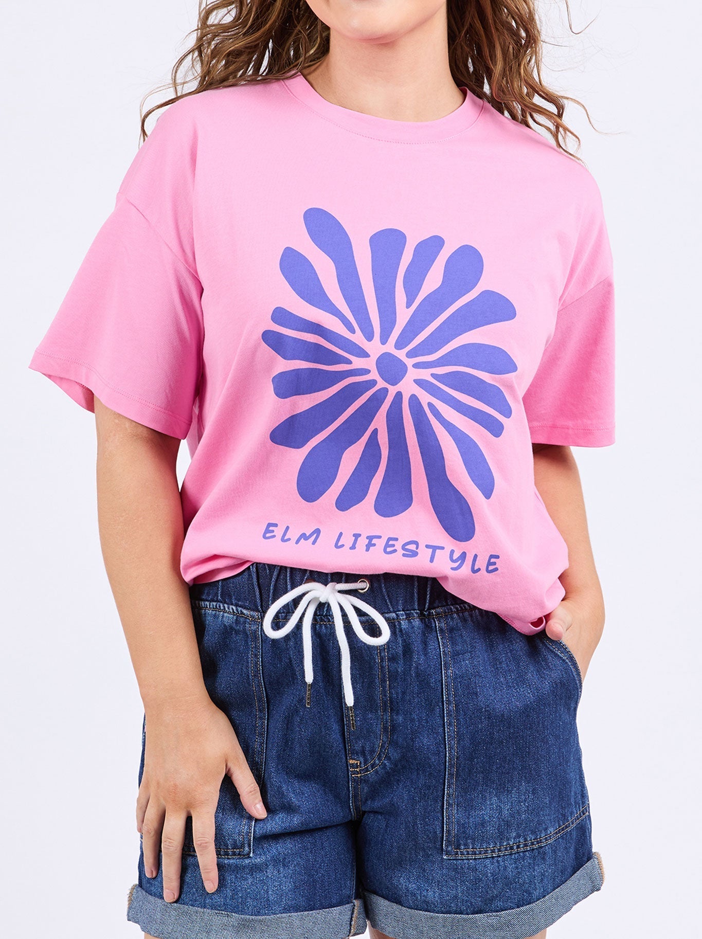 Image of a model wearing Tops. Productname: ELM CAMELIA TEE in Chateau colour by brand - Elm