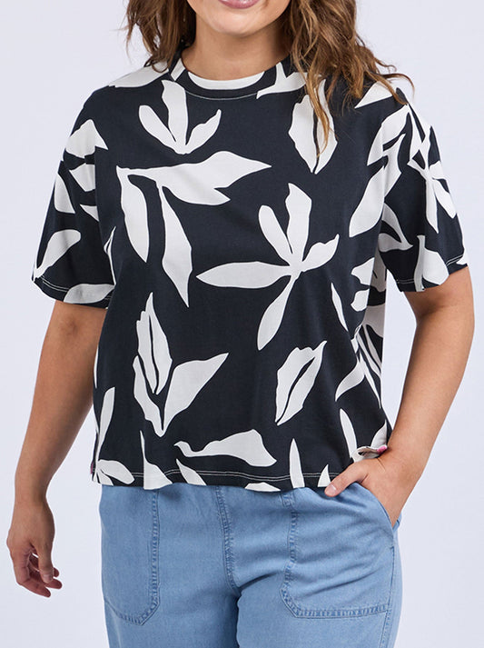 Image of a model wearing Tops. Productname: ELM MIMOSA TEE in Black Print colour by brand - Elm