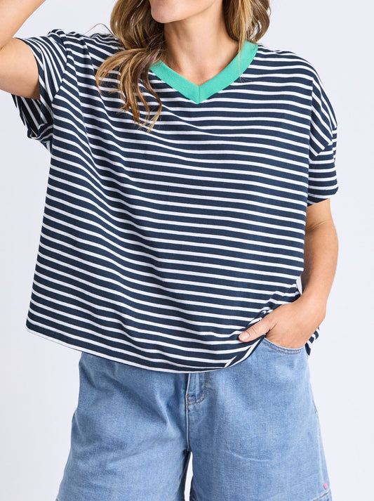 Image of a model wearing Tops. Productname: ELM SABRINA TEE in Navy White colour by brand - Elm