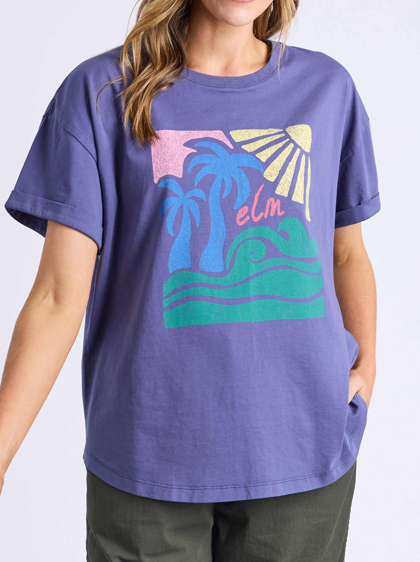 Image of a model wearing Tops. Productname: ELM TROPICAL NIGHTS TEE in Vintage Blue colour by brand - Elm