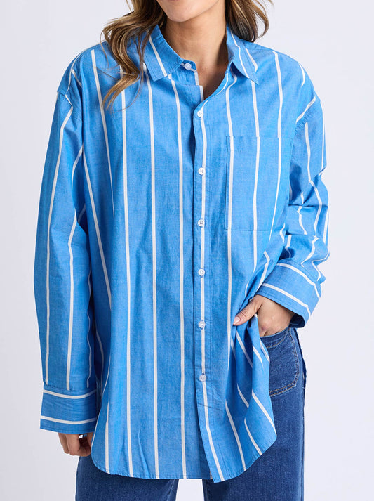 Image of a model wearing Tops. Product name - Elm Mia Stripe Shirt in Royal Blue colour by brand - Elm