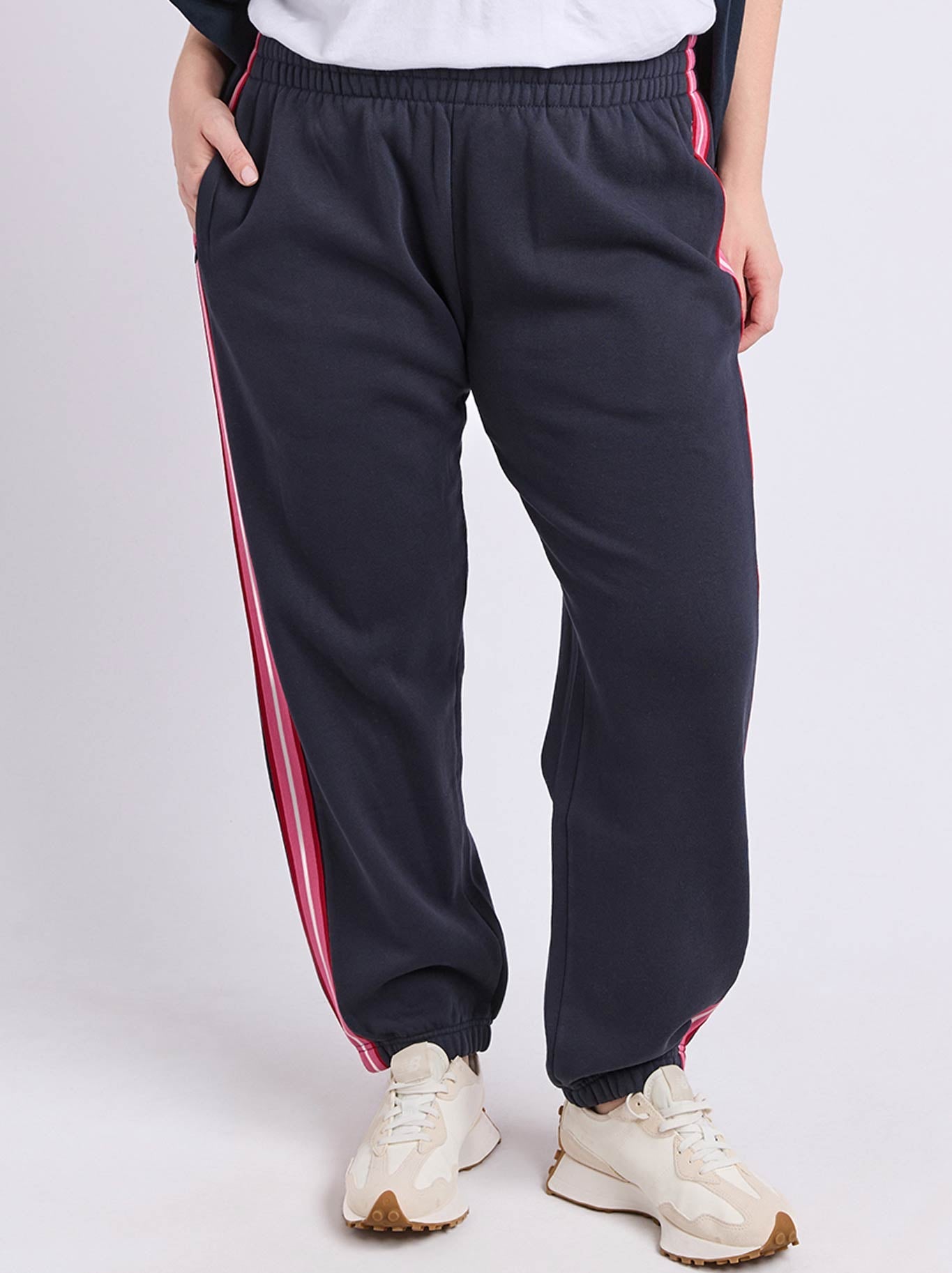 Image of a model wearing Pants. Product name - Elm Lover Trackpant in Navy A colour by brand - Elm