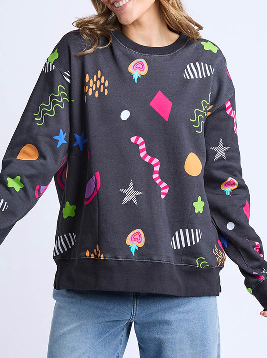 Image of a model wearing Tops. Product name - ELM DEB MCNAUGHTON LIQUORICE GALAXY CREW in Midnight colour by brand - Elm