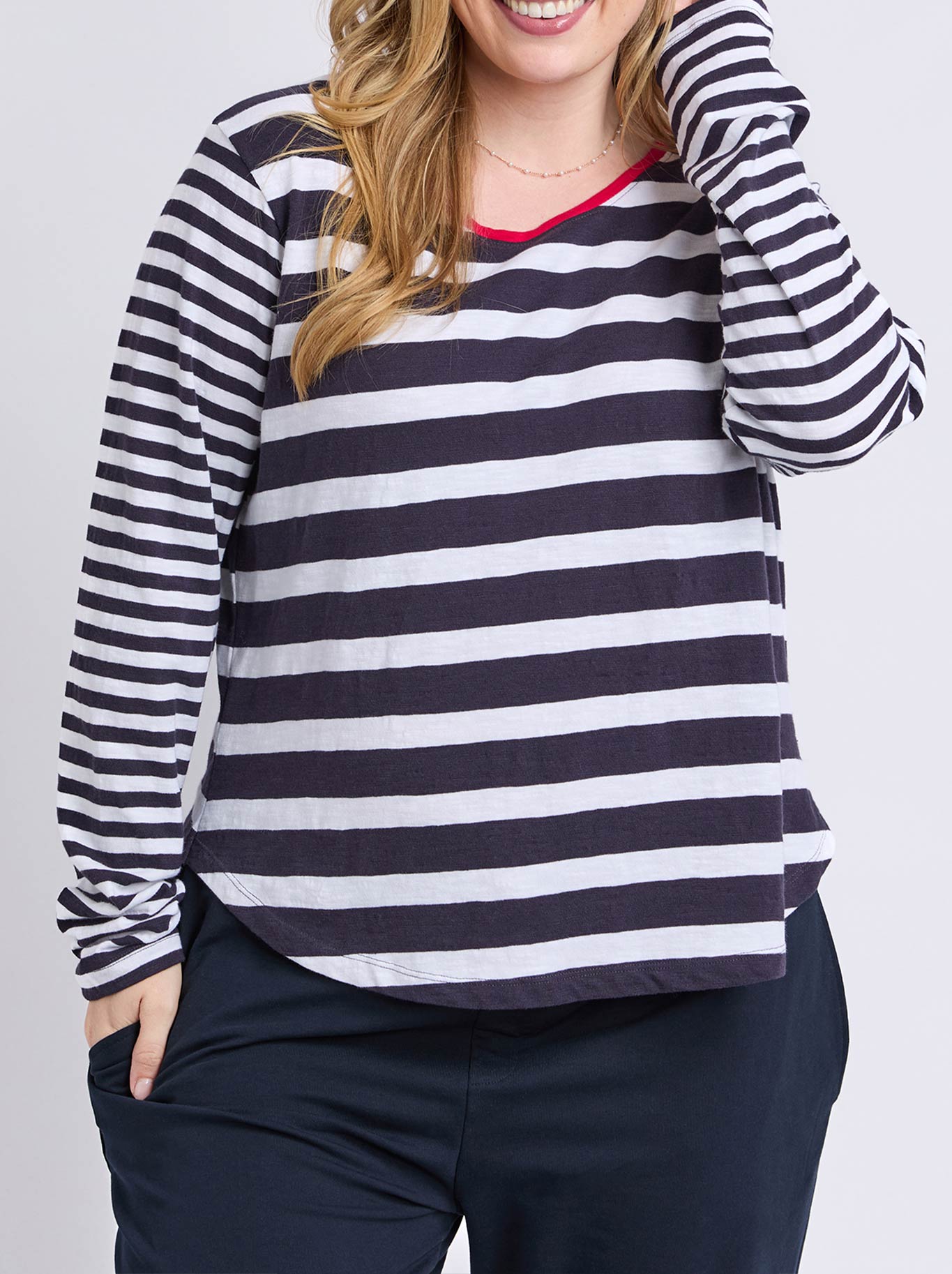 Image of a model wearing Tops. Product name - Elm All Sorts Top in Midnight/White colour by brand - Elm