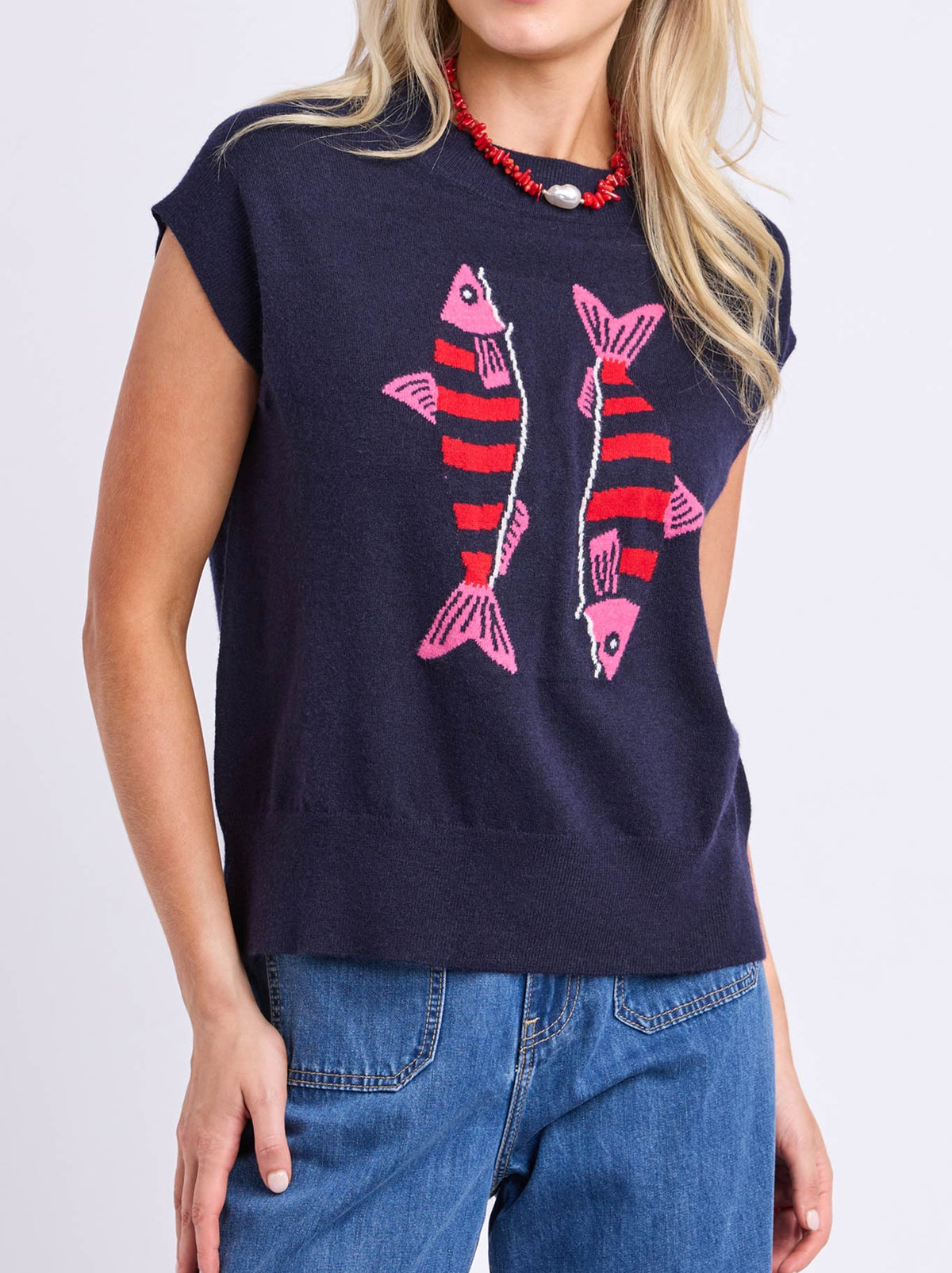 Image of a model wearing Outerwear. Product name - ELM FISHY INTARSIA KNIT in Navy colour by brand - Elm