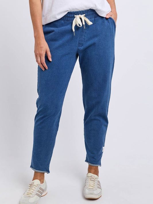Image of a model wearing Pants. Product name - Elm Rickety Pant in Blue colour by brand - Elm