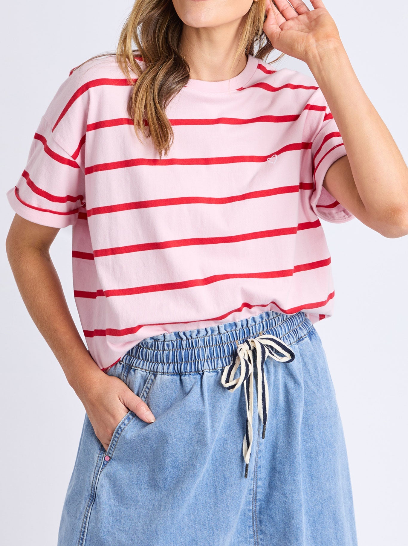 Image of a model wearing Tops. Productname: Elm Halli Short Sleeve Tee in White/Springgreen colour by brand - Elm