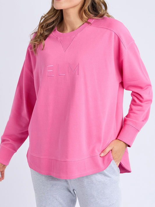 Image of a model wearing Tops. Productname: ELM ESTABLISHED CREW in Aurora colour by brand - Elm