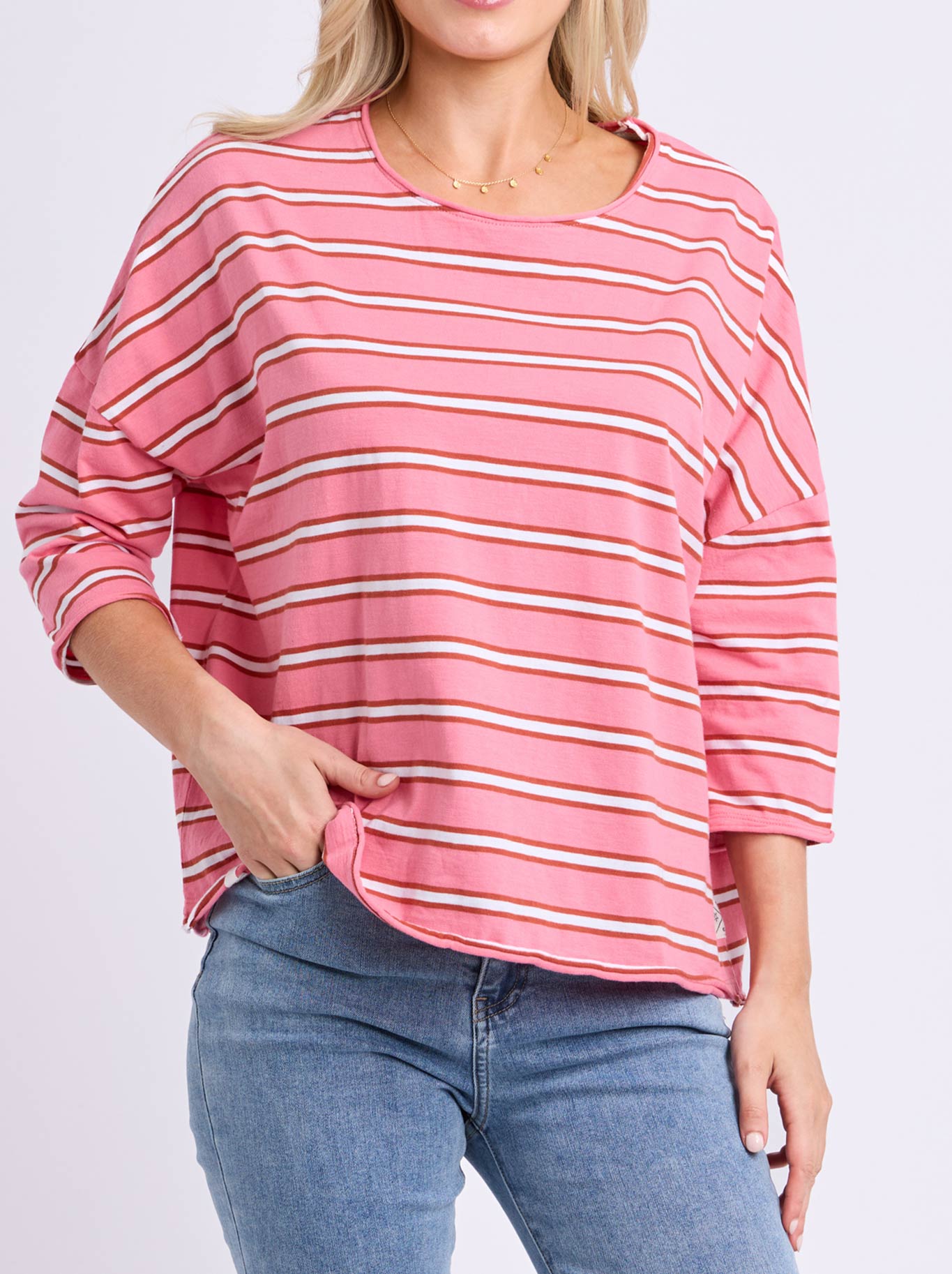 Image of a model wearing Tops. Product name - Elm Anya Tee in Pink Lemonade Stripe colour by brand - Elm