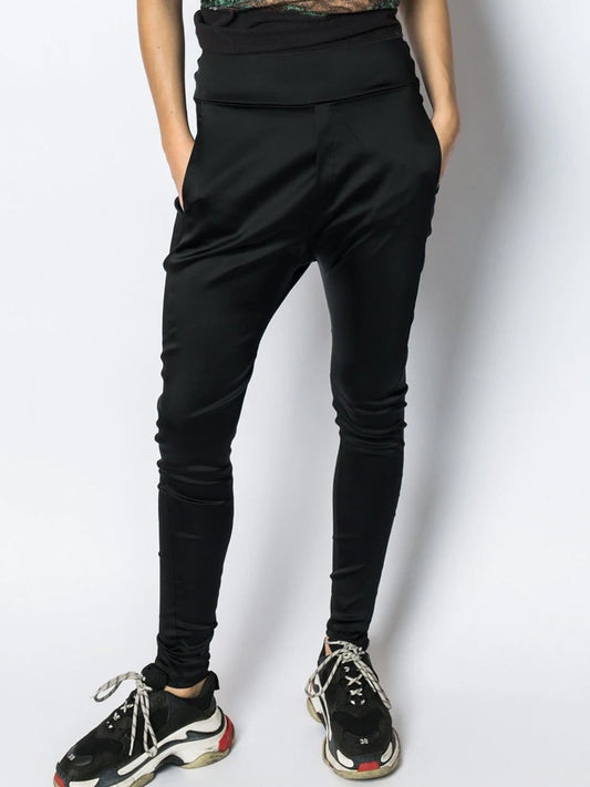 Image of a model wearing Pants. Productname: EMPIRE ROSE LUXE HIGH RISE TRAINER in Black colour by brand - Empire Rose