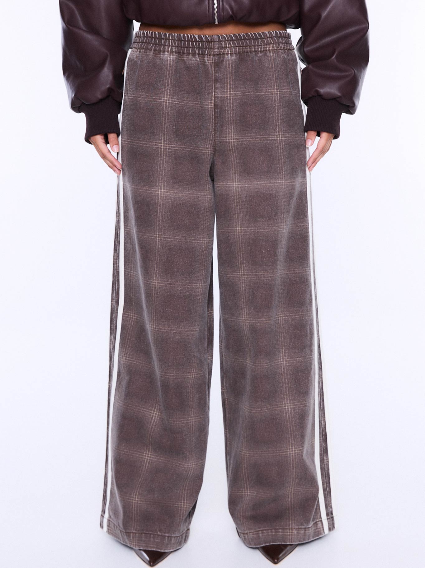 Image of a model wearing Pants. Product name - ENA PELLY MYLA WIDE LEG PANT in Burgandy Check colour by brand - Ena Pelly