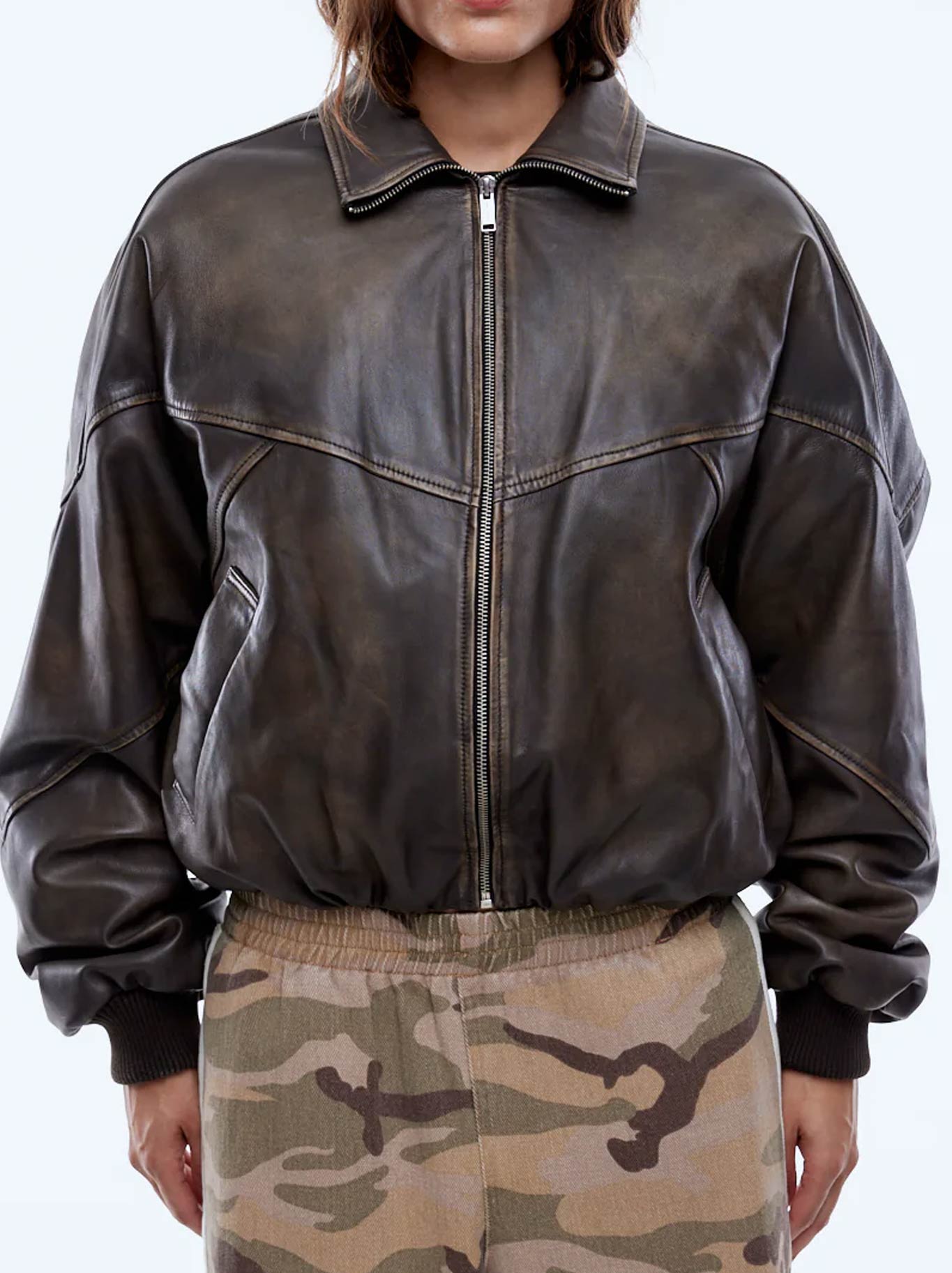 Image of a model wearing Outerwear. Productname: ENA PELLY MARI LEATHER BOMBER in Mocca colour by brand - Ena Pelly