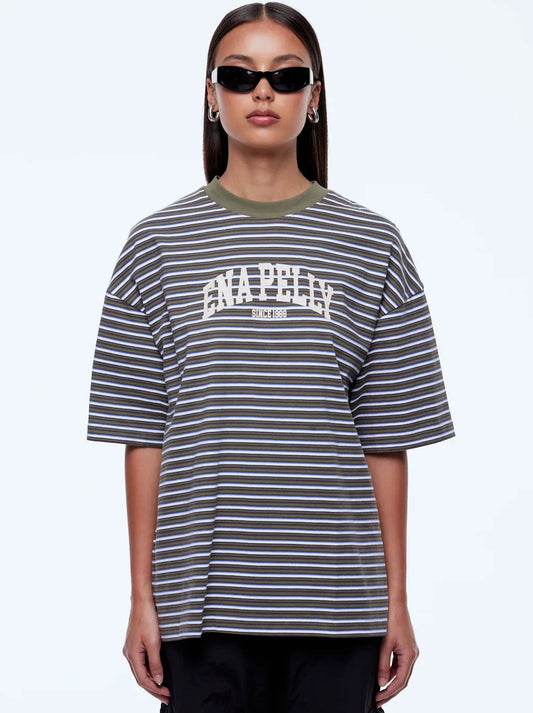 Image of a model wearing Tops. Product name - ENA PELLY MAEVE RELAXED TEE in Green Multi Stripe colour by brand - Ena Pelly