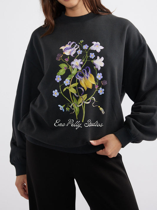 Image of a model wearing Outerwear. Productname: ENA PELLY BOTANIC SWEATSHIRT in Vintage Black colour by brand - Ena Pelly