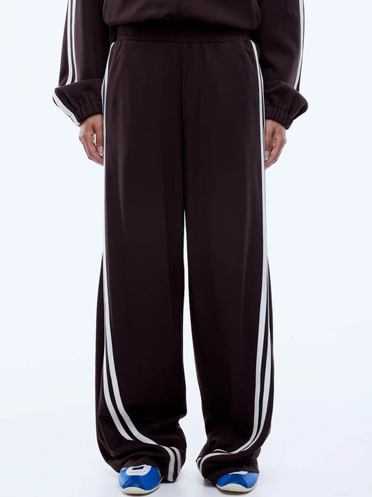 Image of a model wearing Pants. Productname: ENA PELLY VALENTINA STRIPE PANT in Cocoa colour by brand - Ena Pelly