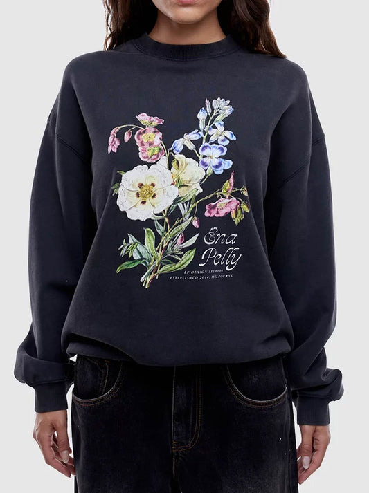 Image of a model wearing Outerwear. Productname: VINTAGE BOUQUET SWEATSHIRT in Vintage Black colour by brand - Ena Pelly